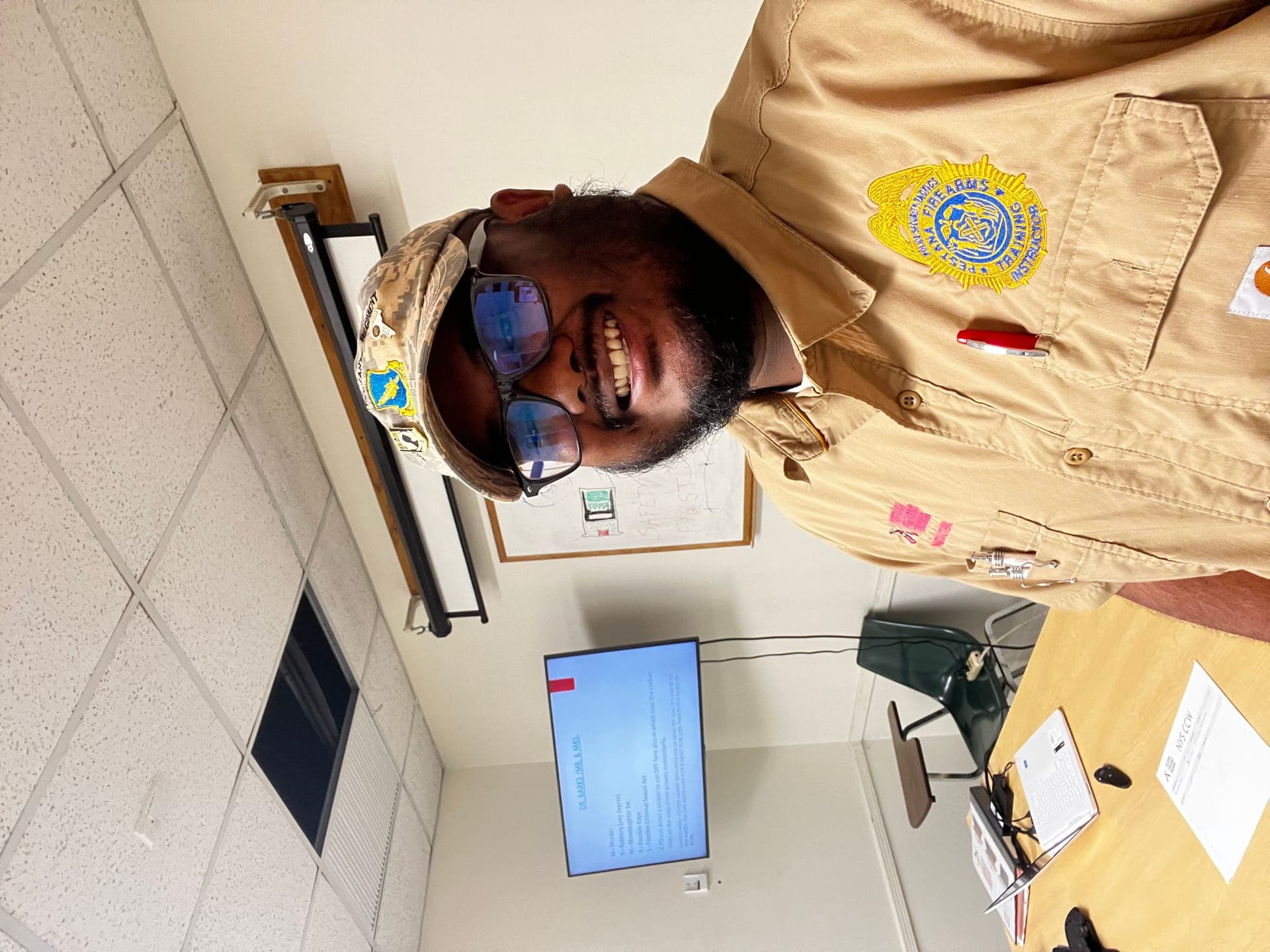 Instructor Anthony Pestana in PFT uniform — classroom session